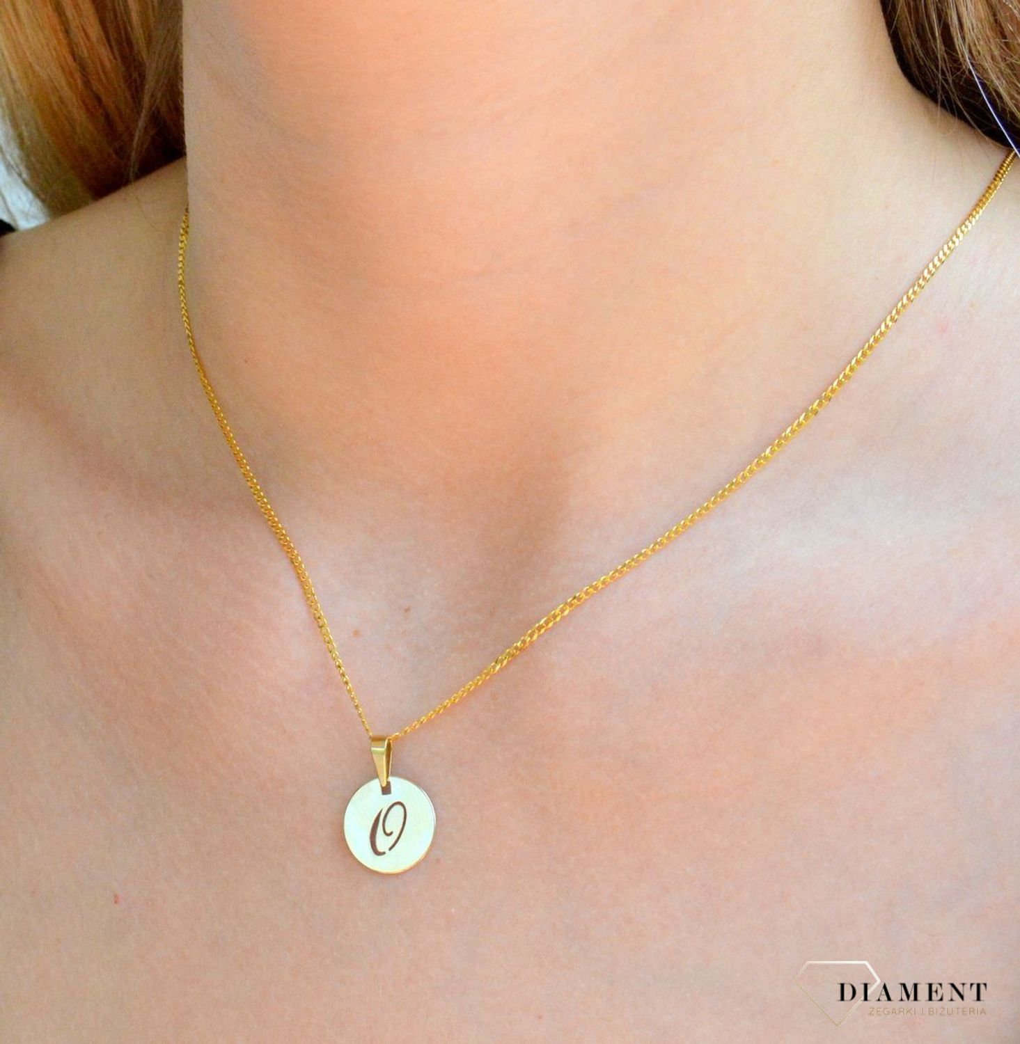 Zawieszka okrągła z wyciętą literką O ZA 4978O.jpg